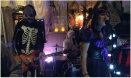 The Rhythm Collective band playing live at the Street Inn Haloween party in 2015